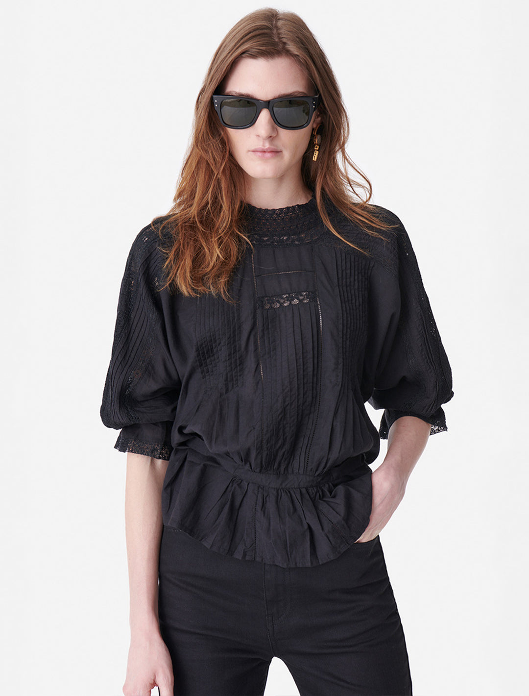 Model wearing Vanessa Bruno's viva blouse in noir.