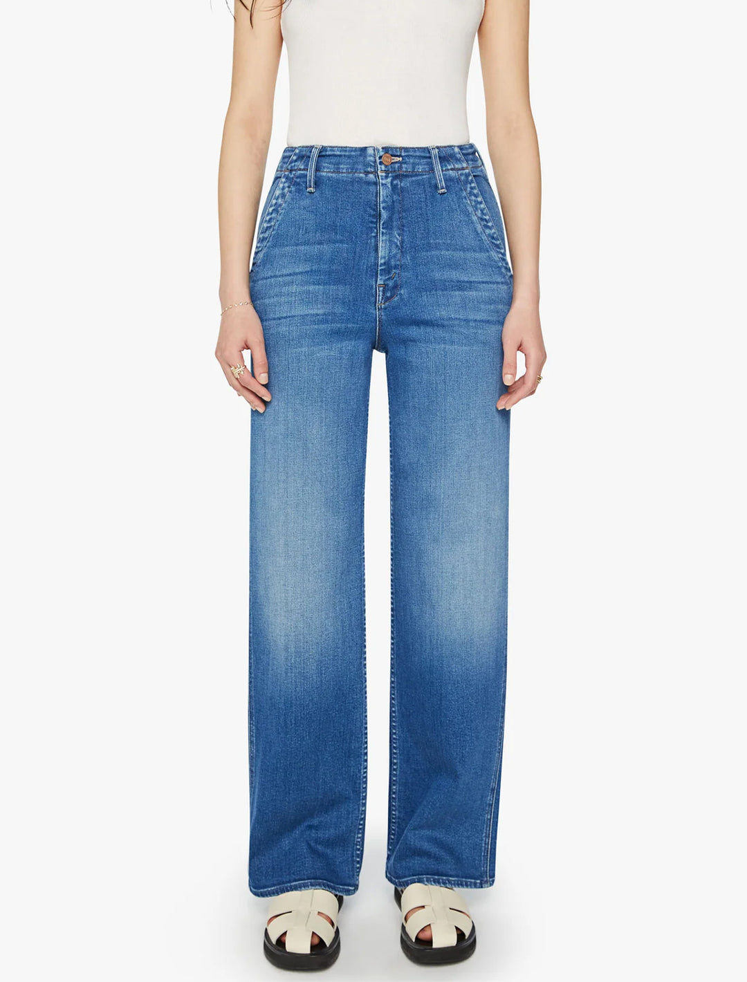 Model wearing Mother Denim's the major zip skimp in work hard play hard.