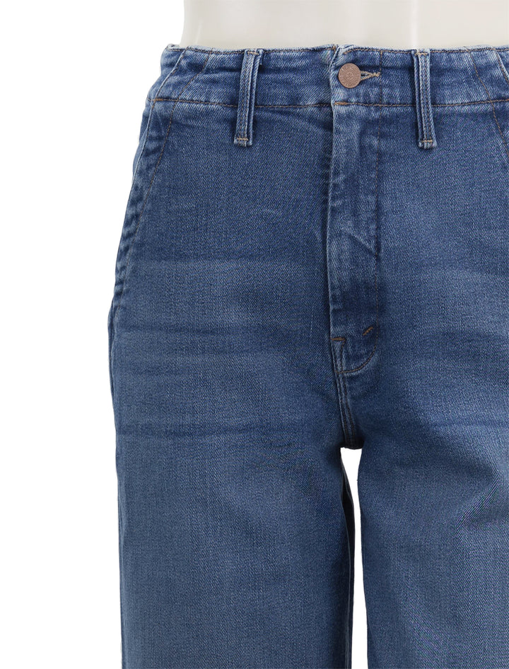 Close-up view of Mother Denim's the major zip skimp in work hard play hard.