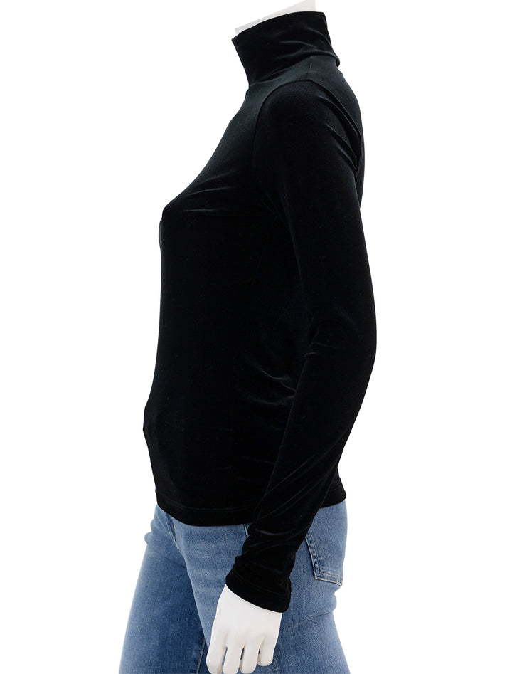 Side view of AGOLDE's pascale turtleneck in black.