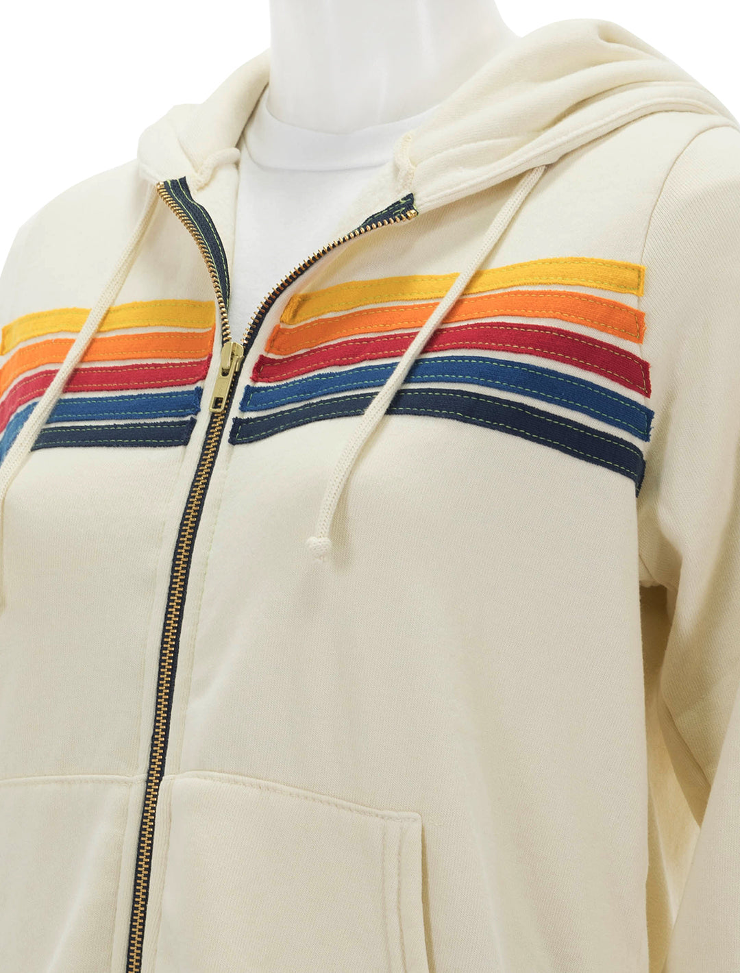 Close-up view of Aviator Nation's 5 stripe zip hoodie in vintage white.