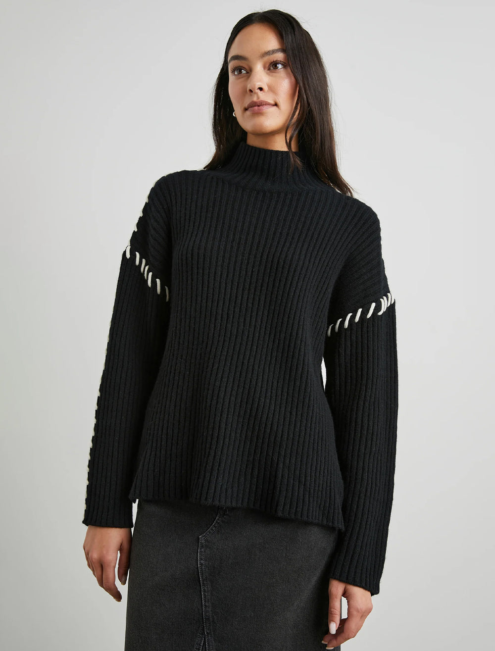 Model wearing Rails' liam pullover in black.