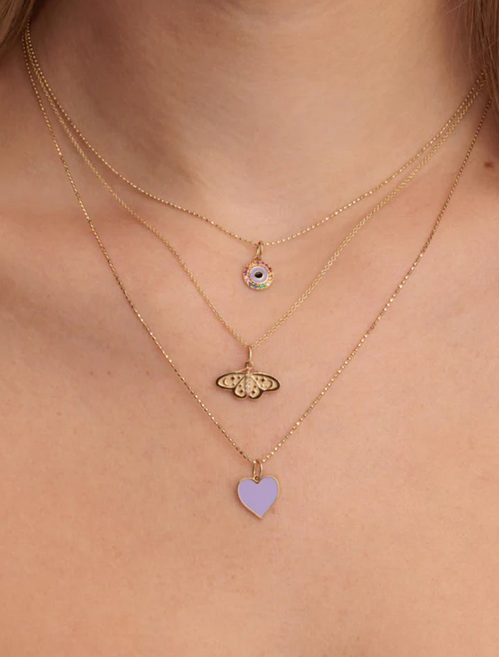 Model wearing Sydney Evan's Small Celestial Moth Charm Necklace.