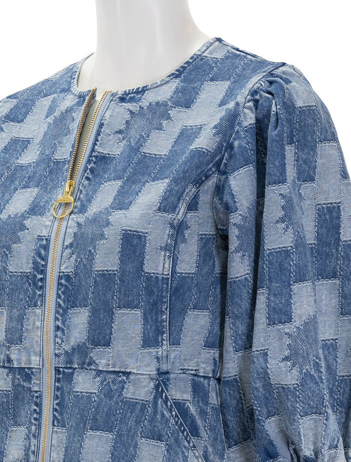 Close-up view of Barbour's bowhill mini dress in patchwork denim.