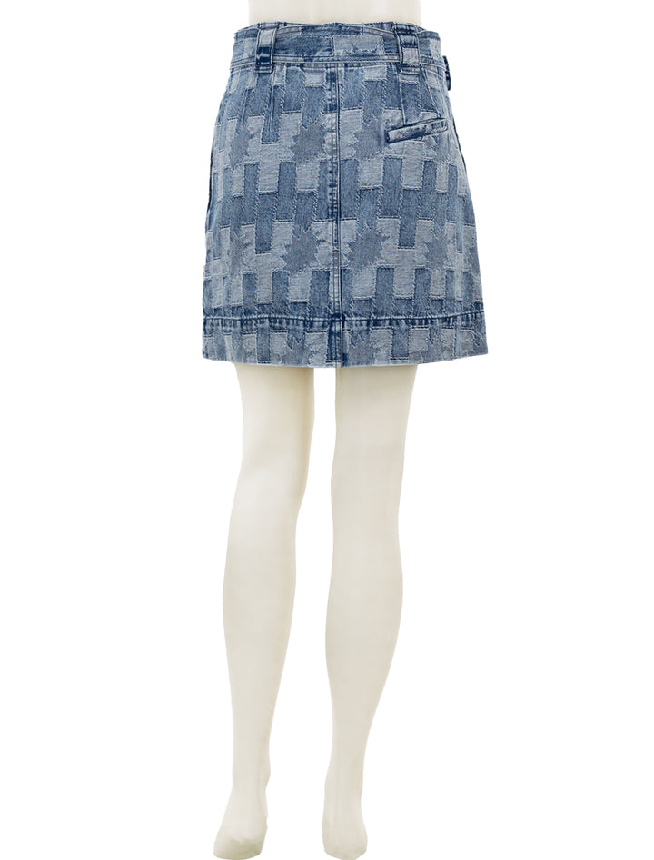 Back view of Barbour's bowhill mini skirt in patchwork denim.
