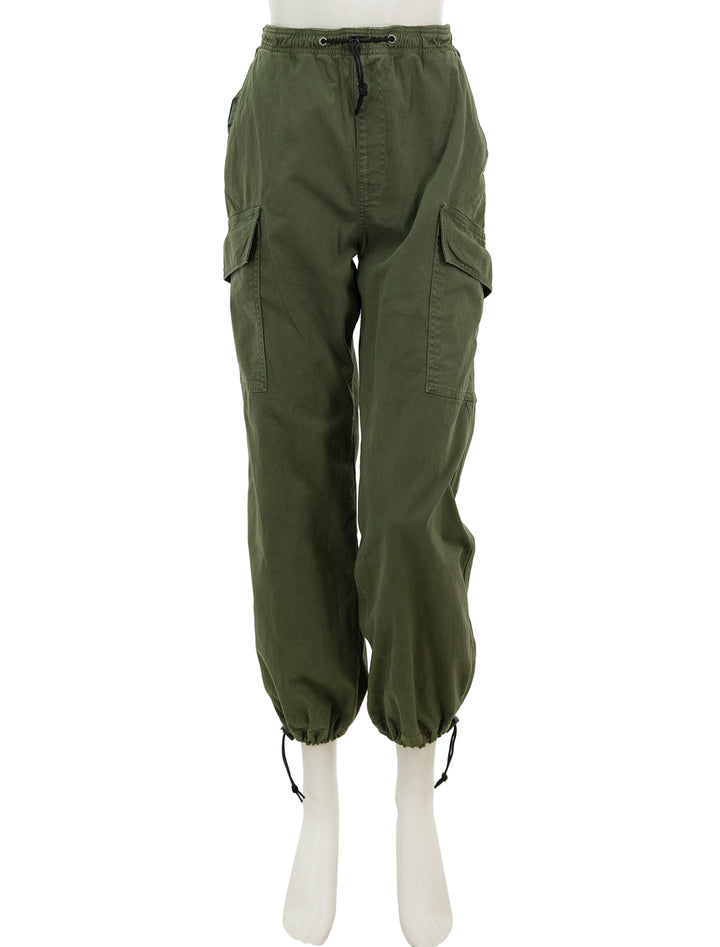 Front view of ASKK NY's parachute pant in fatigue.
