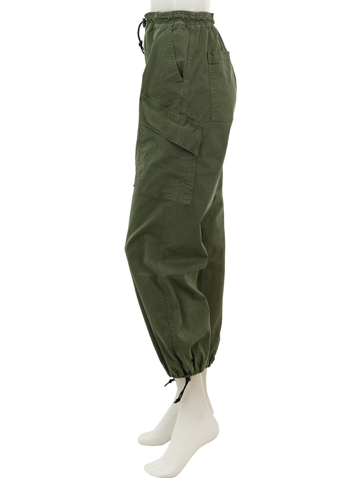 Side view of ASKK NY's parachute pant in fatigue.