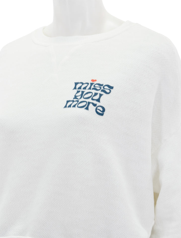 Close-up view of ASKK NY's oversized sweatshirt in miss you more.