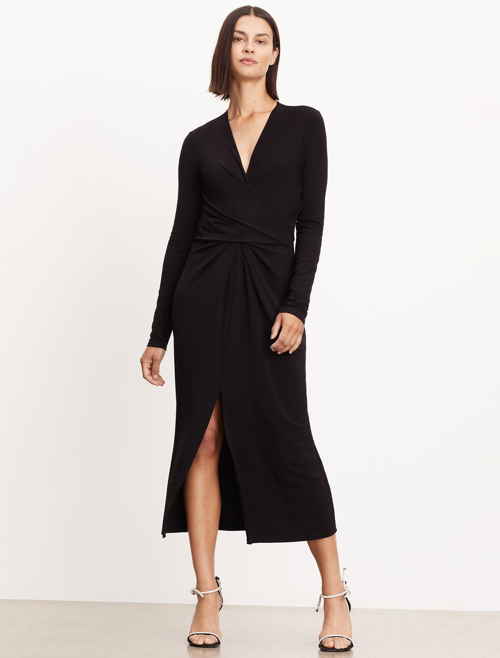 Model wearing Velvet by Graham & Spencer's Eliana Dress in Black Matte Jersey.
