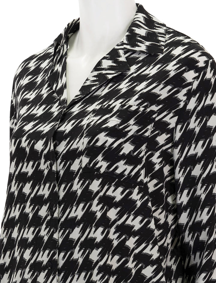 Close-up view of Anine Bing's aiden top in houndstooth.