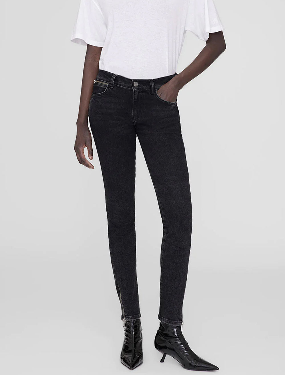 Model wearing Anine Bing's jax jean in smoke black.