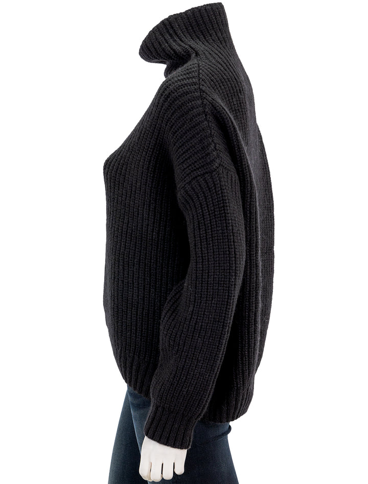 Side view of Anine Bing's sydney sweater in black.