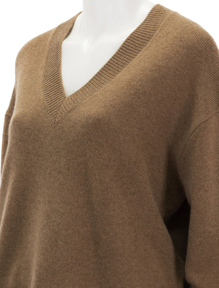 Close-up view of Anine Bing's lee sweater in camel.