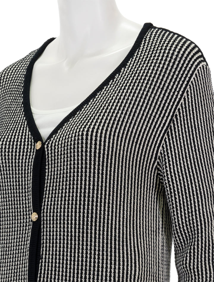 Close-up view of Anine Bing's dave cardigan in black and white.