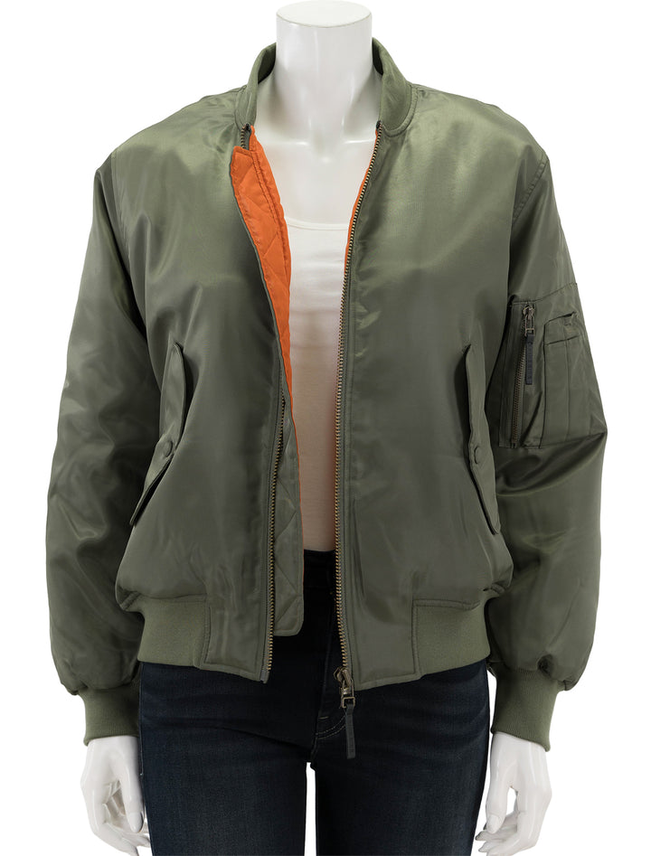 Front view of Anine Bing's leon bomber in army, unzipped.