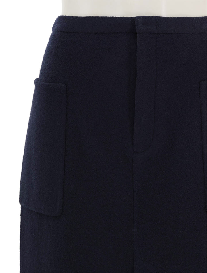 Close-up view of Vince's brushed wool pencil skirt in deep caspian.