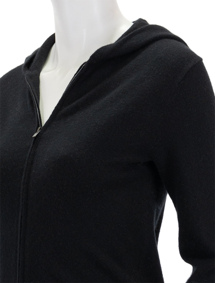 Close-up view of Vince's zip hoodie in fine gauge black.