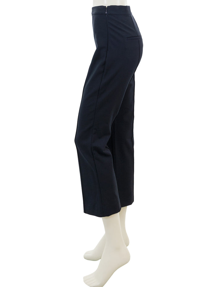 Side view of Vince's mid rise pintuck crop flare pant in coastal.