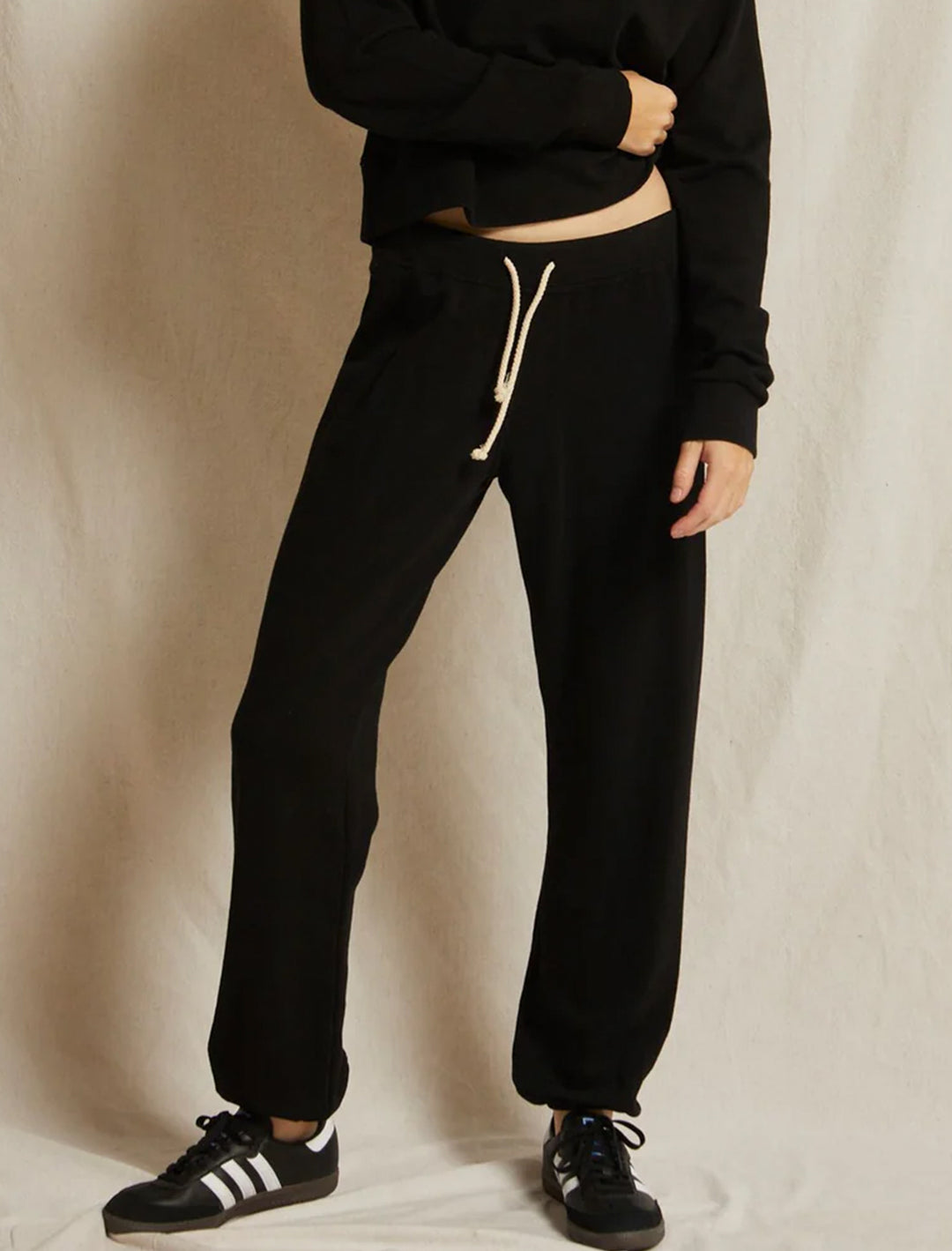 Model wearing Perfectwhitetee's toni jogger in true black.