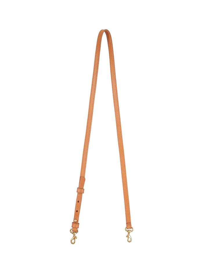 Overhead view of Clare V.'s adjustable crossbody strap in cuoio.
