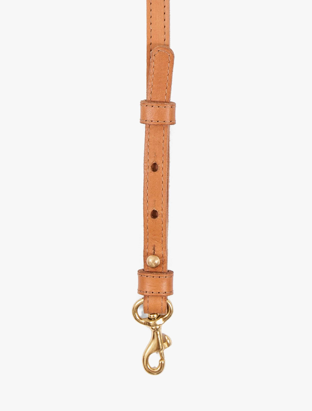 Close-up view of Clare V.'s adjustable crossbody strap in cuoio.