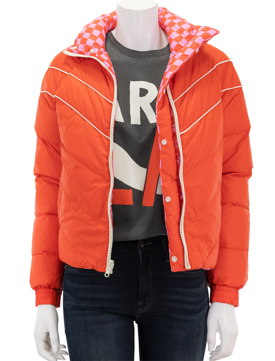 Front view of Marine Layer's archive reversible puffer in poinciana, unzipped.