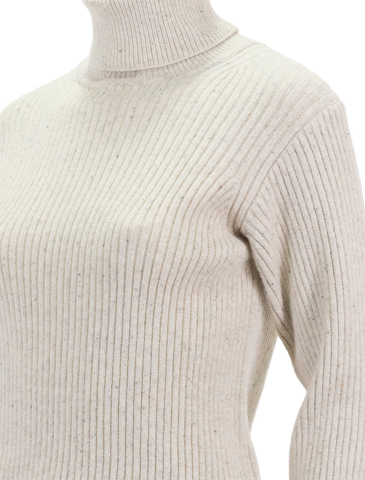 Close-up view of Marine Layer's isla knit turtleneck in oatmeal.