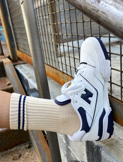 Model wearing Le Bon Shoppe's boyfriend socks in cashew.