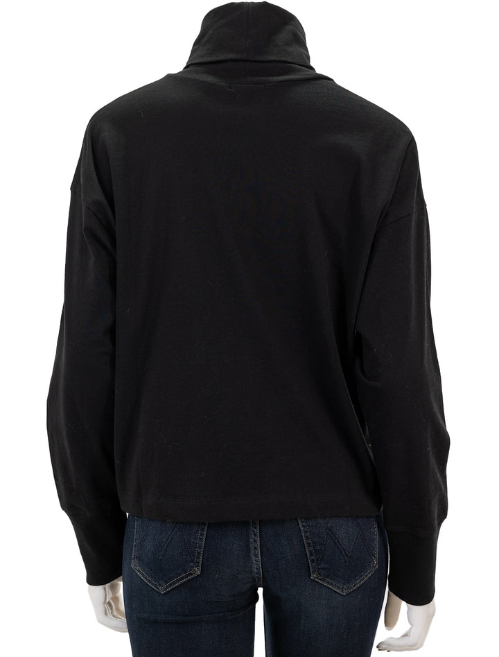 Back view of ATM's heavy cotton oversized turtleneck in black.