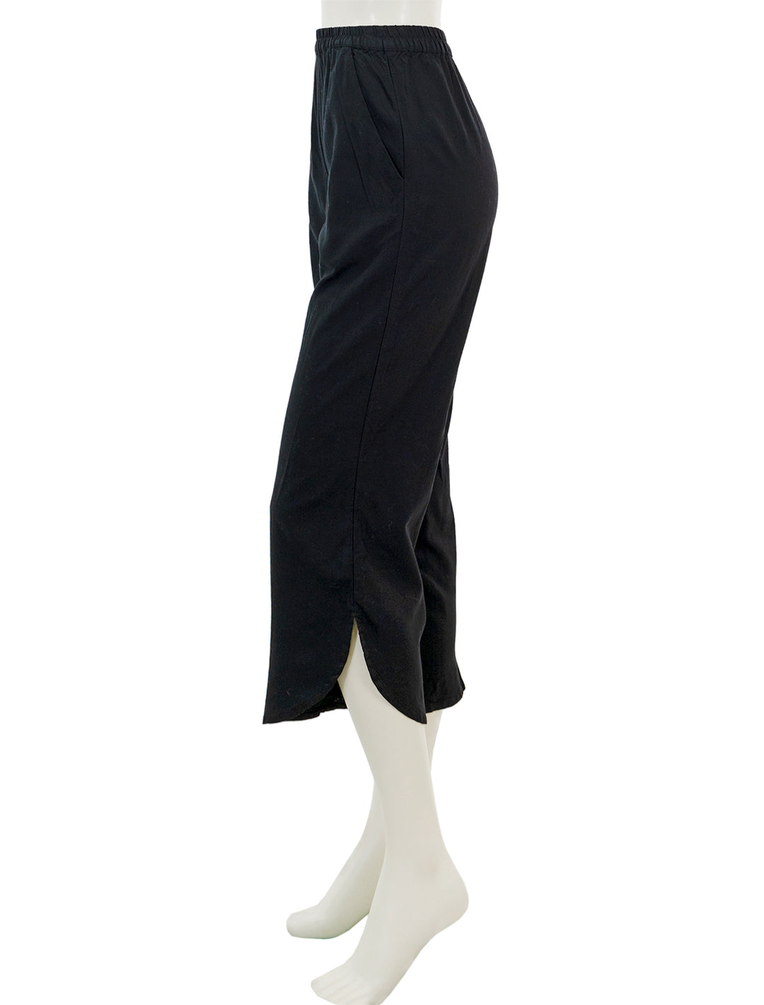 Side view of Marine Layer's wide leg allison pant in black.