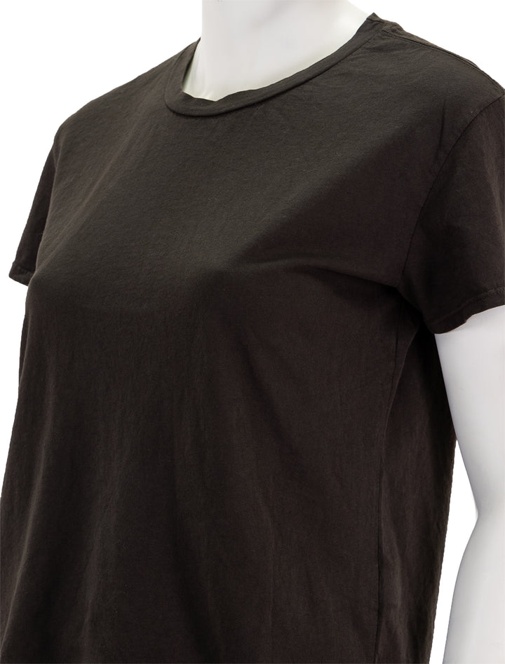 Close-up view of Perfectwhitetee's harley tee in cafe.
