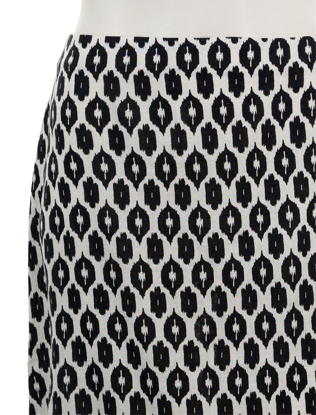 close up view of ryan midi slip skirt in black and white ikat