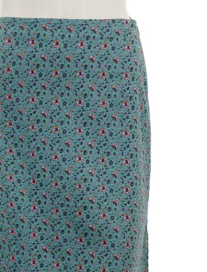 close up view of ryan midi slip skirt in deep sea floral