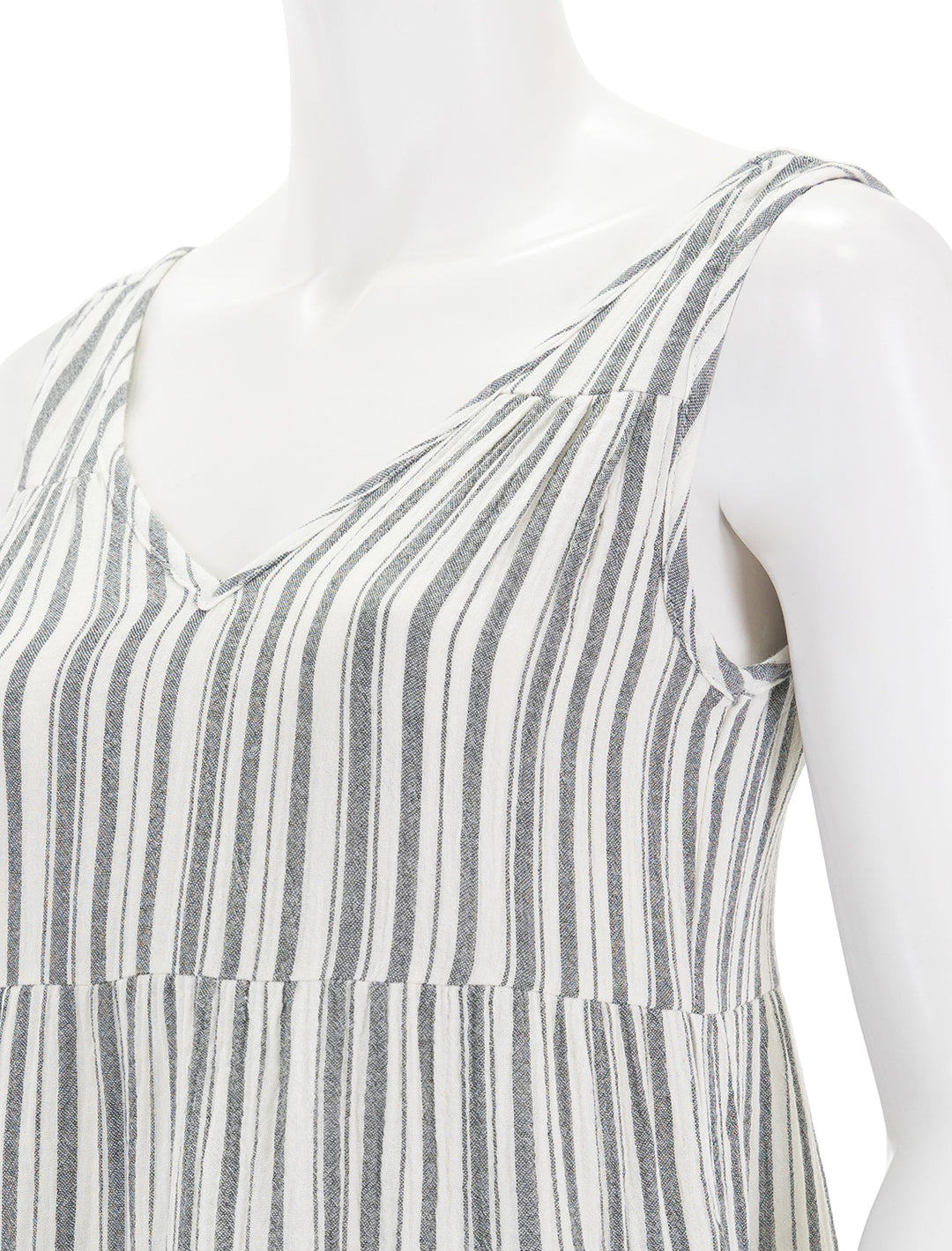 Close-up view of Marine Layer's corinne maxi dress in mixed black and white stripe.