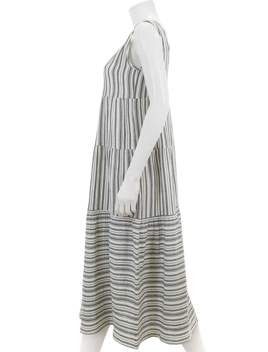Side view of Marine Layer's corinne maxi dress in mixed black and white stripe.