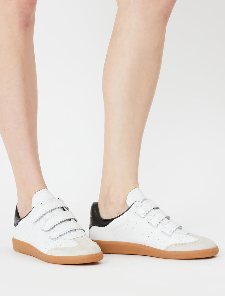 Model wearing Isabel Marant Etoile's Beth Sneaker in White.