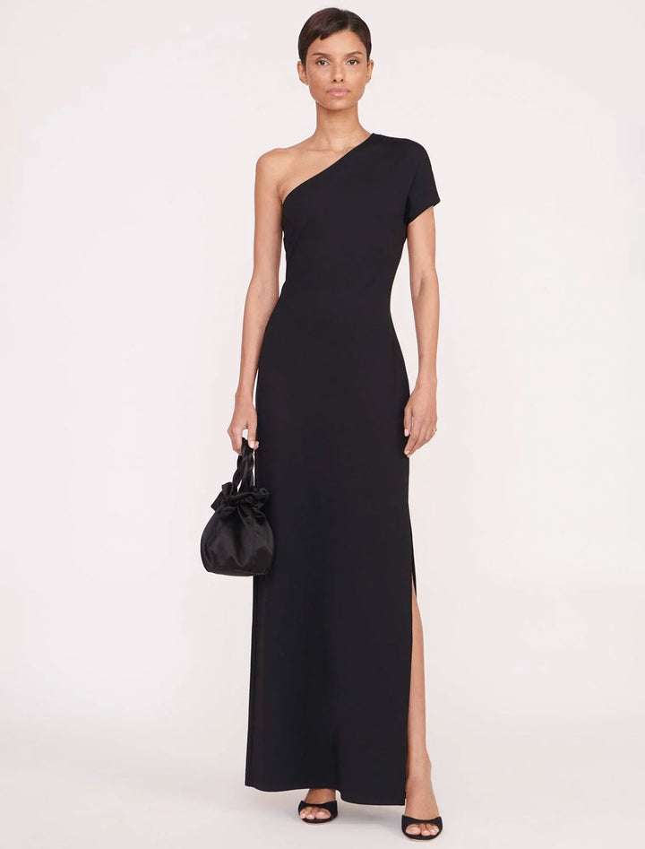 Model wearing STAUD's adalynn dress in black.