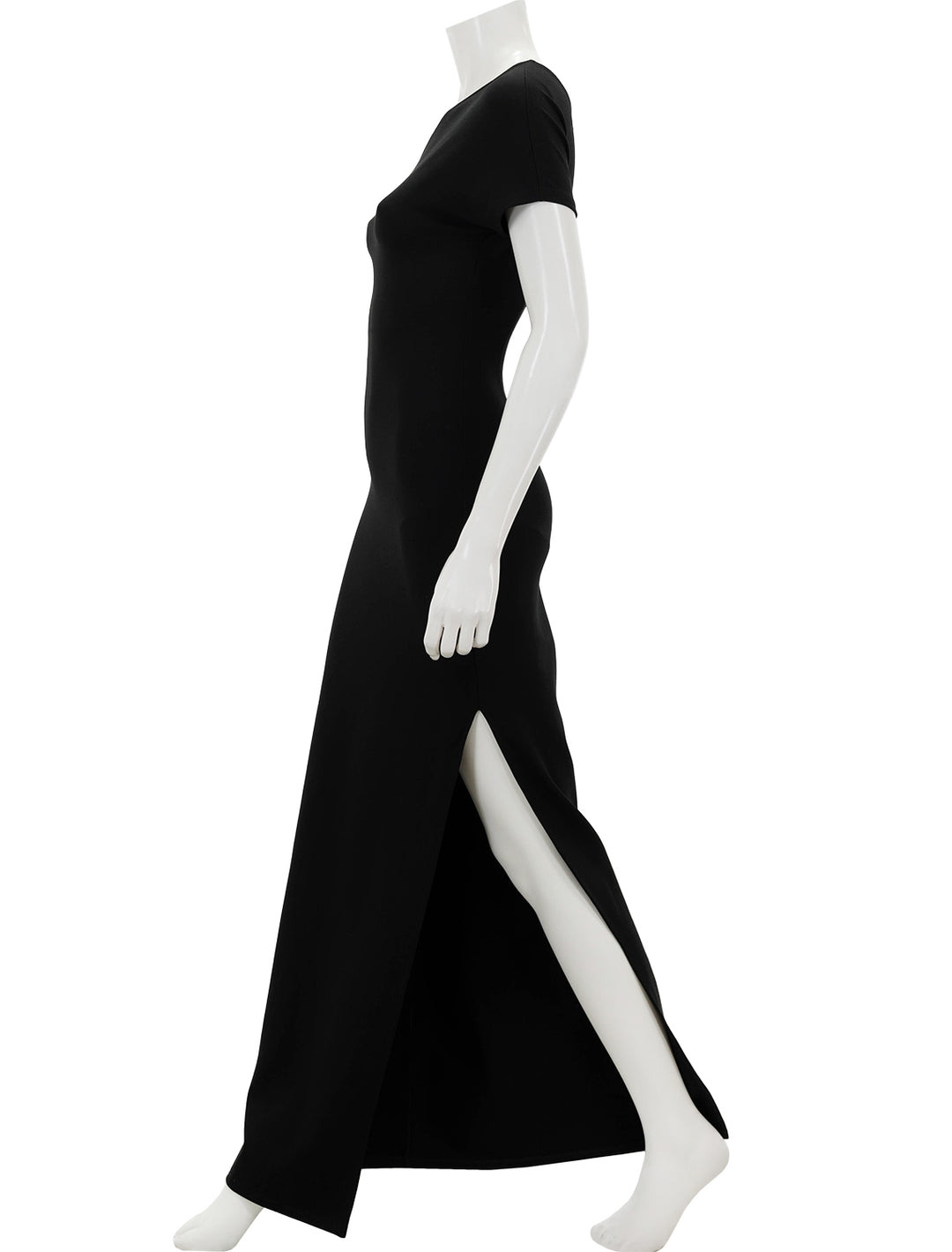 Side view of STAUD's adalynn dress in black.