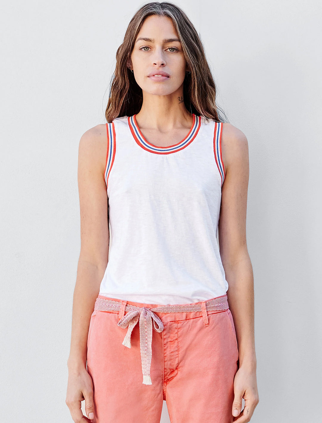 Model wearing Sundry's ringer racerback tank in white.