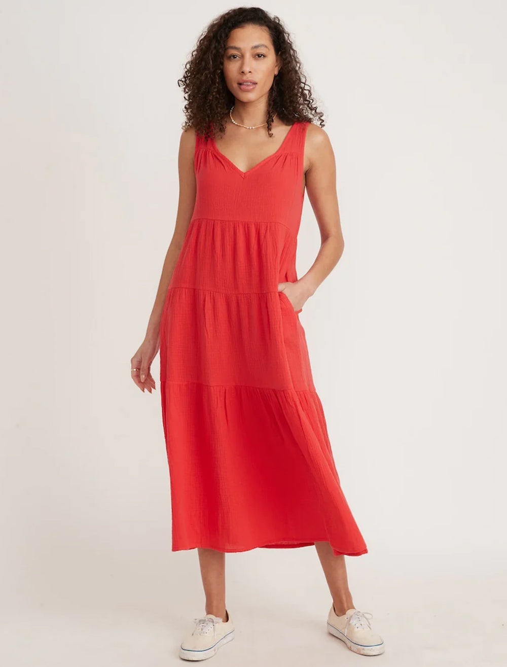 Model wearing Marine Layer's corinne maxi dress in red.