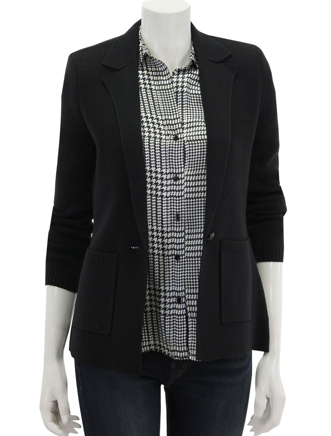 Front view of L'agence's lacey knit blazer in black, unbuttoned.