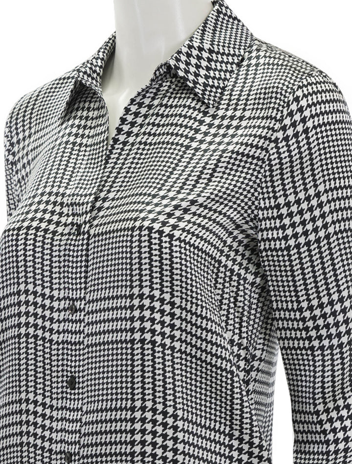 Close-up view of L'Agence Dani Three Quarter Sleeve Blouse in Ivory Black Glen Plaid.