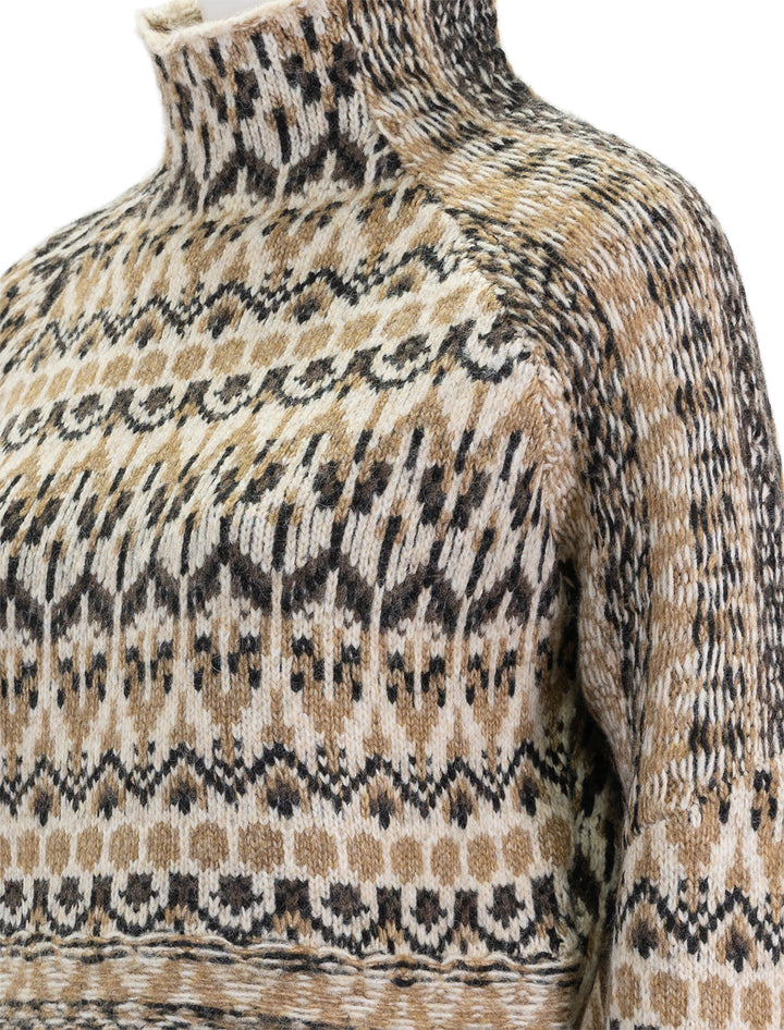 Close-up view of Steve Madden's indie sweater in multi.