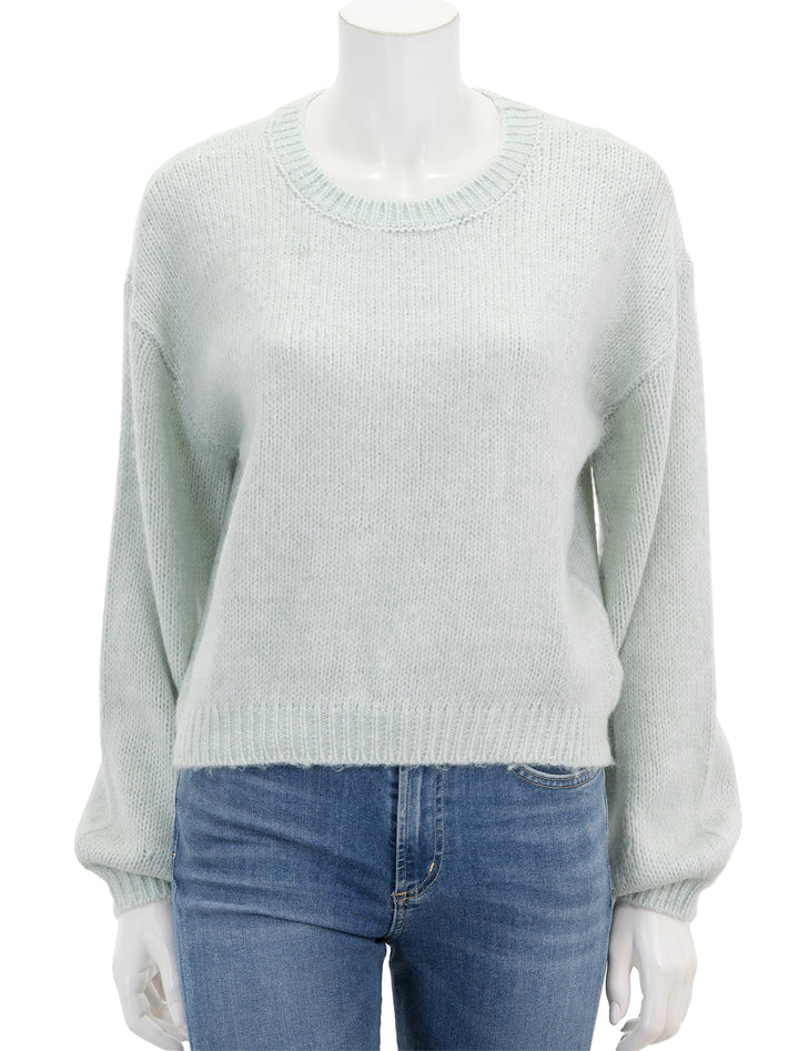 Front view of Steve Madden's colette sweater in jade cream.