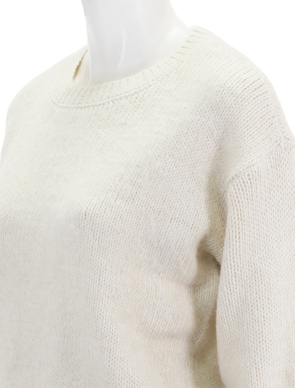 Close-up view of Steve Madden's colette sweater in whisper white.
