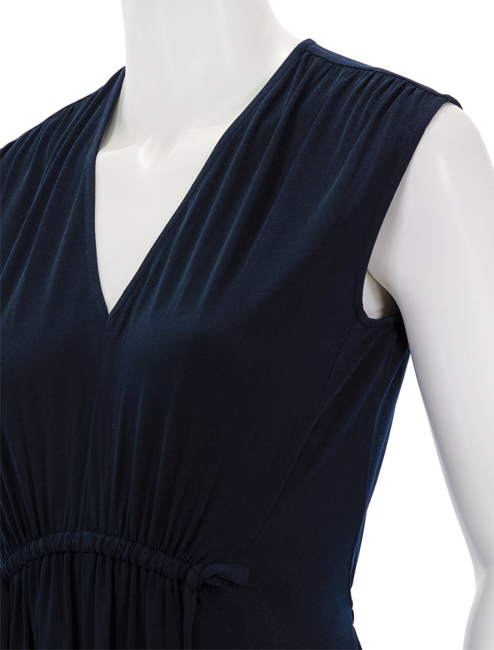 Close-up view of Derek Lam 10 Crosby's lea sleeveless drawstring front dress.