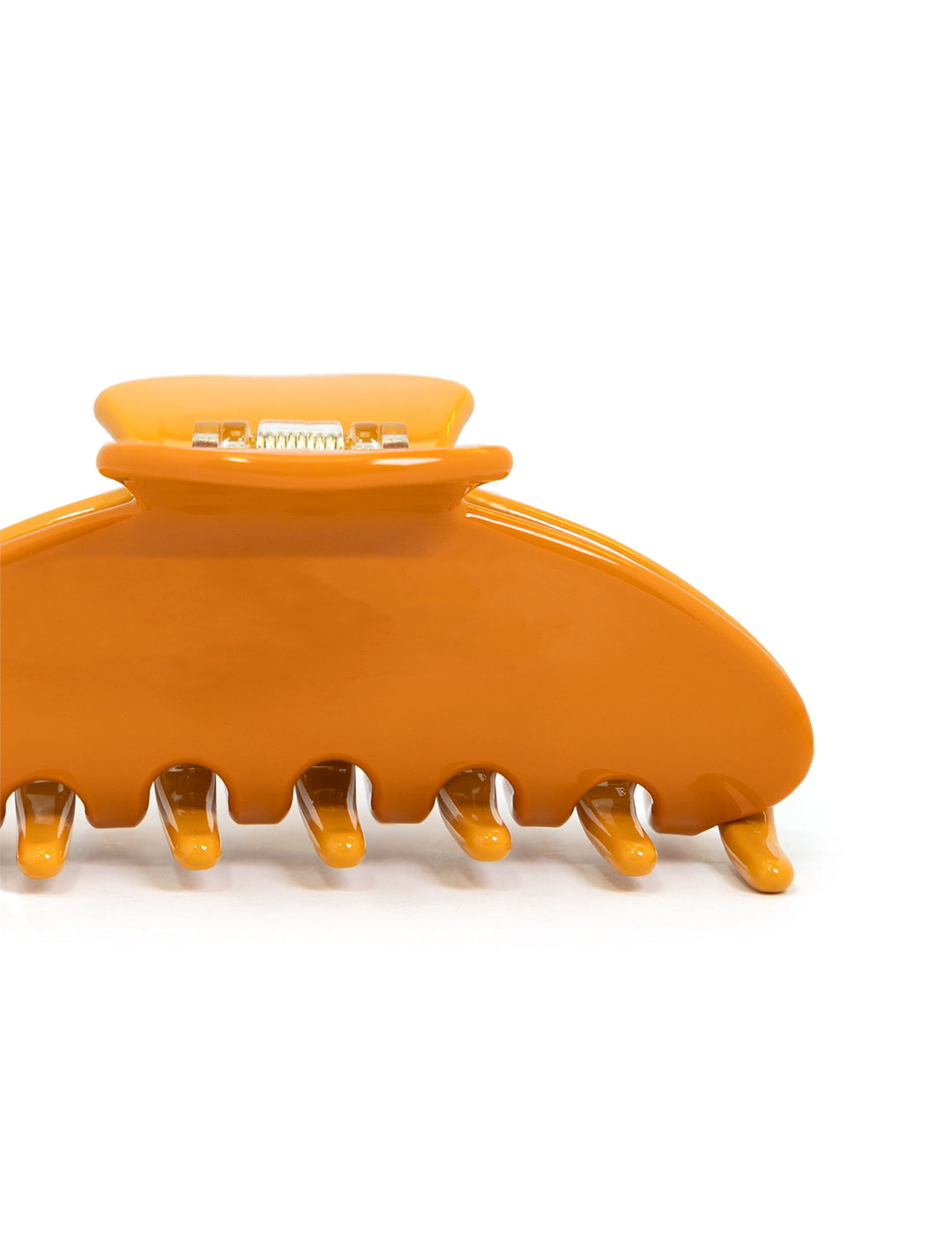 Close-up view of Nat + Noor's medium hair claw citrus.