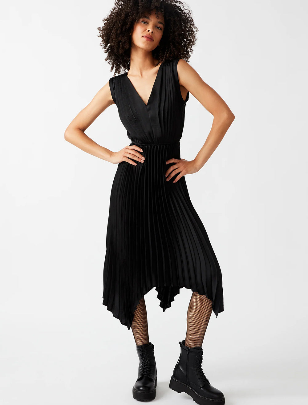 Model wearing Steve Madden's donna dress in black.