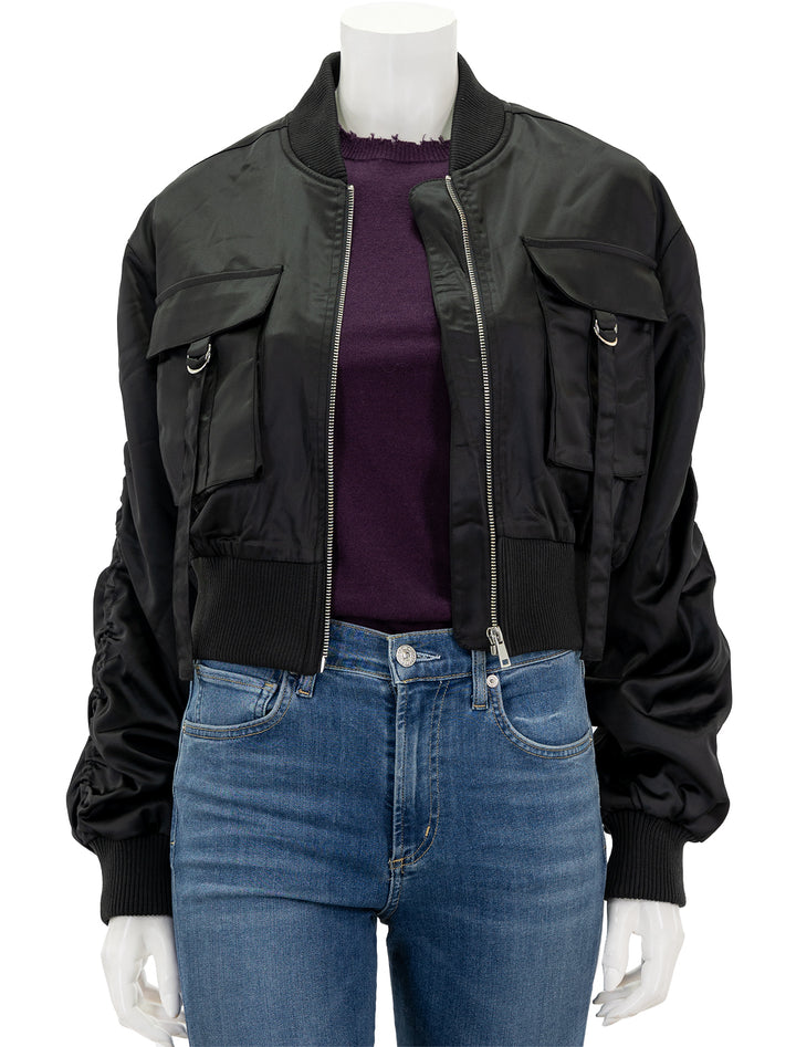 Front view of Steve Madden's costa jacket in black, unbuttoned.