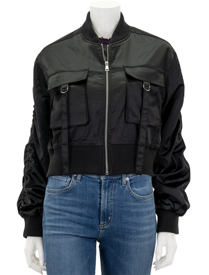 Front view of Steve Madden's costa jacket in black, zipped.